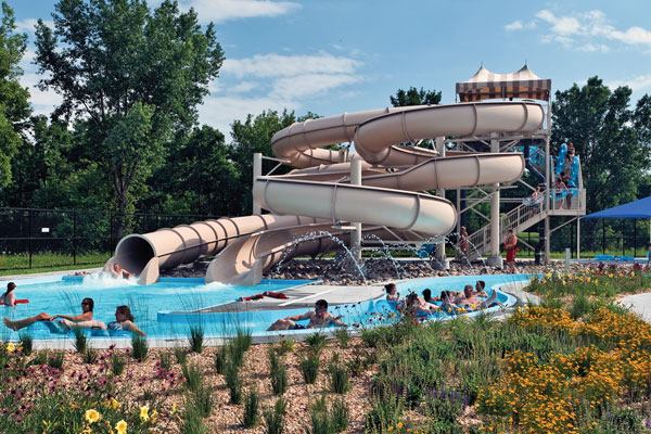 In developing the Donald

and Ruth Furman Aquatic Center, designers paid special attention

to maintaining the ecological characteristics of the sight.

Ultimately, only one mature tree was removed in construction, and

all of the plant material outside of the deck areas is native to

Story County, Iowa. Much of the project site has been seeded with a

native mix of grasses and wildflowers to maintain the

location’s biodiversity, aid in storm-water infiltration and

create a wildlife habitat — all while minimizing the amount

of fossil fuels required to maintain the area (compared to the

typical turf grass condition found within municipal

pools).