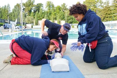 Some of the variation exercises require lifeguards to quickly glove up even if “blindfolded” by a team mate.