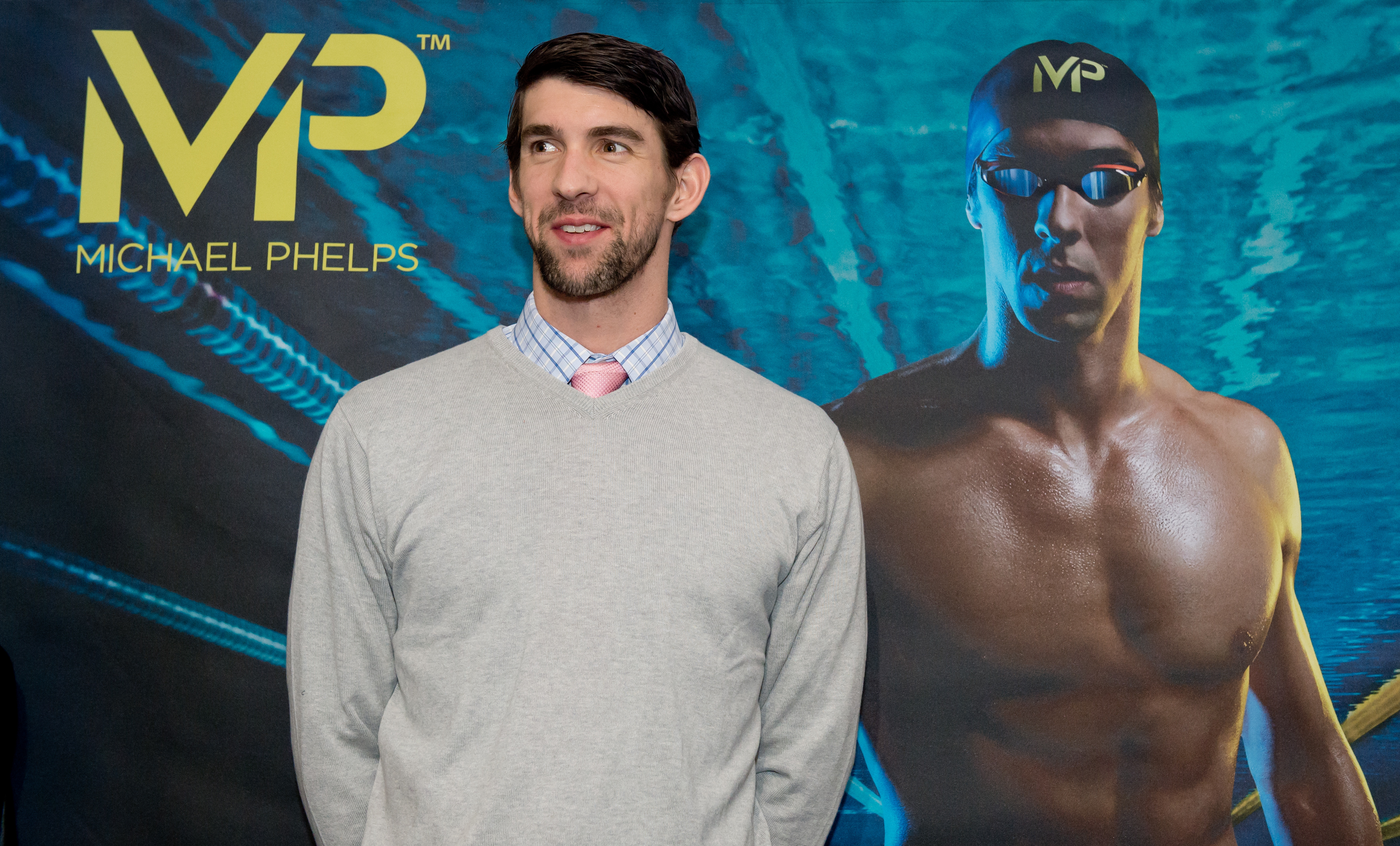 US  swimmer and Olympic champion Michael Phelps speaks at a press conference as part of the ISPO sporting equipment trade show in Munich, GermanyFriday Feb. 6, 2015. In conjunction with the manufacturer Aqua Sphere, Phelps is presenting his own range of swimming equipment at the show. (AP Photo/dpa,Sven Hoppe)