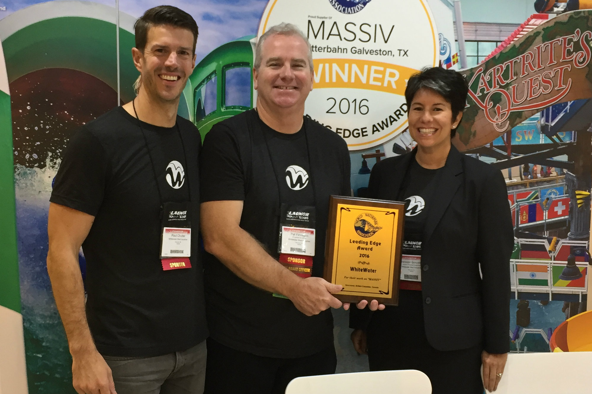 WhiteWater representatives pose with the World Waterpark Association's Leading Edge Award.