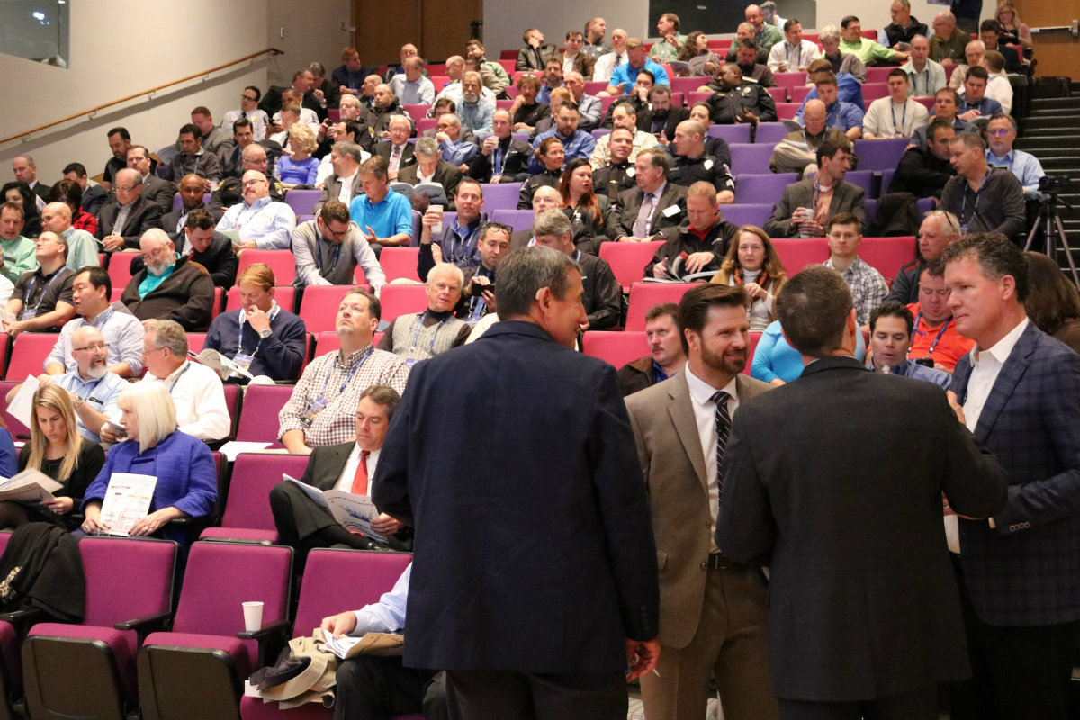 (Far right) David Marsh, who coached the women's 2016 U.S. Olympic swimming team, meets with pool industry professionals during the Ultimate Pool Conference in Charlotte, N.C. Marsh is also head coach of the city's swim club, SwimMAC, which is raising funds to compete in the 2020 Summer Olympics.