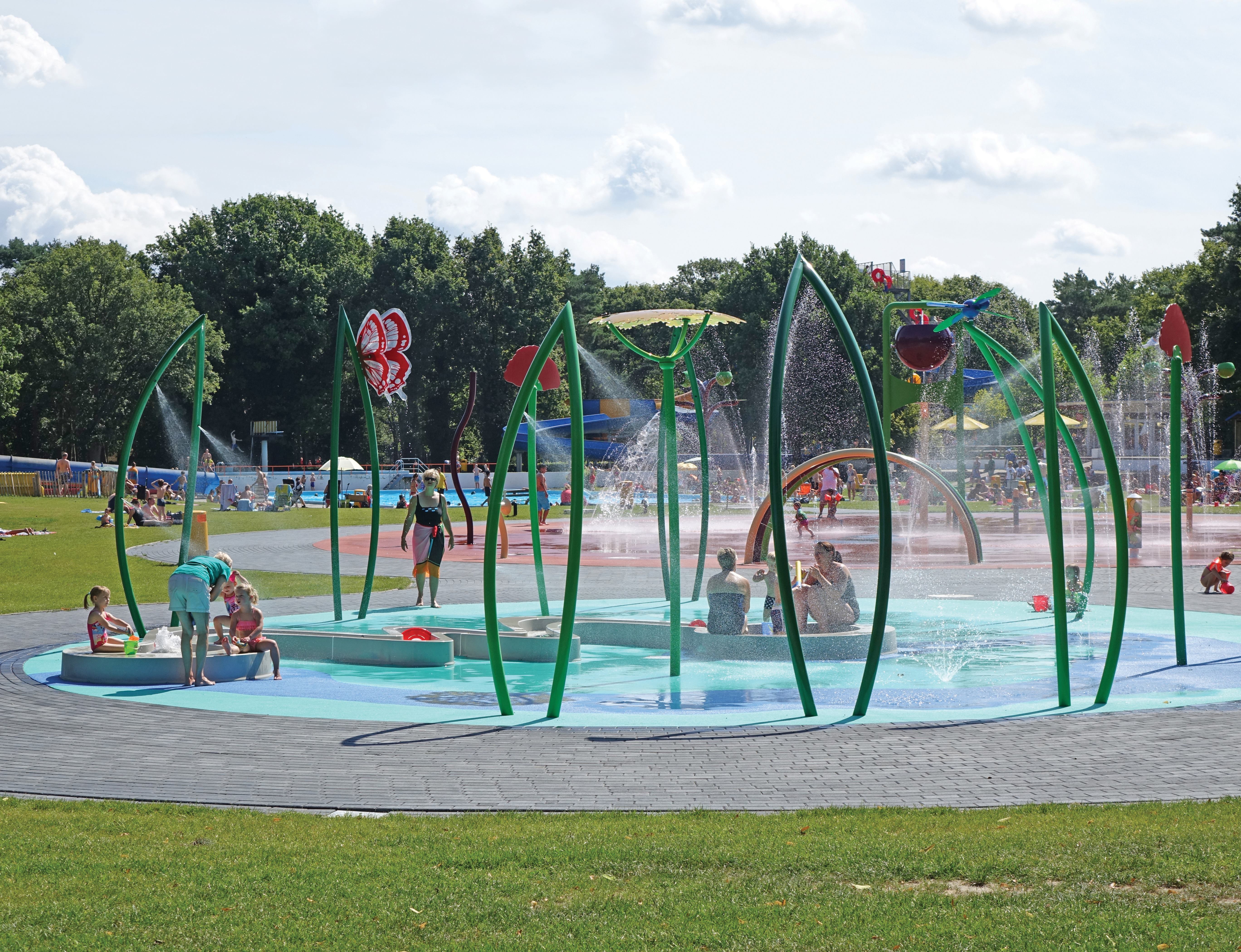 This high-action area, with its bold colors and 40- to 50-gallon-per-minute dumping bucket, is aimed at older children and adults. The low-flow design of the play features creates gentle, natural water effects that reduce water consumption.