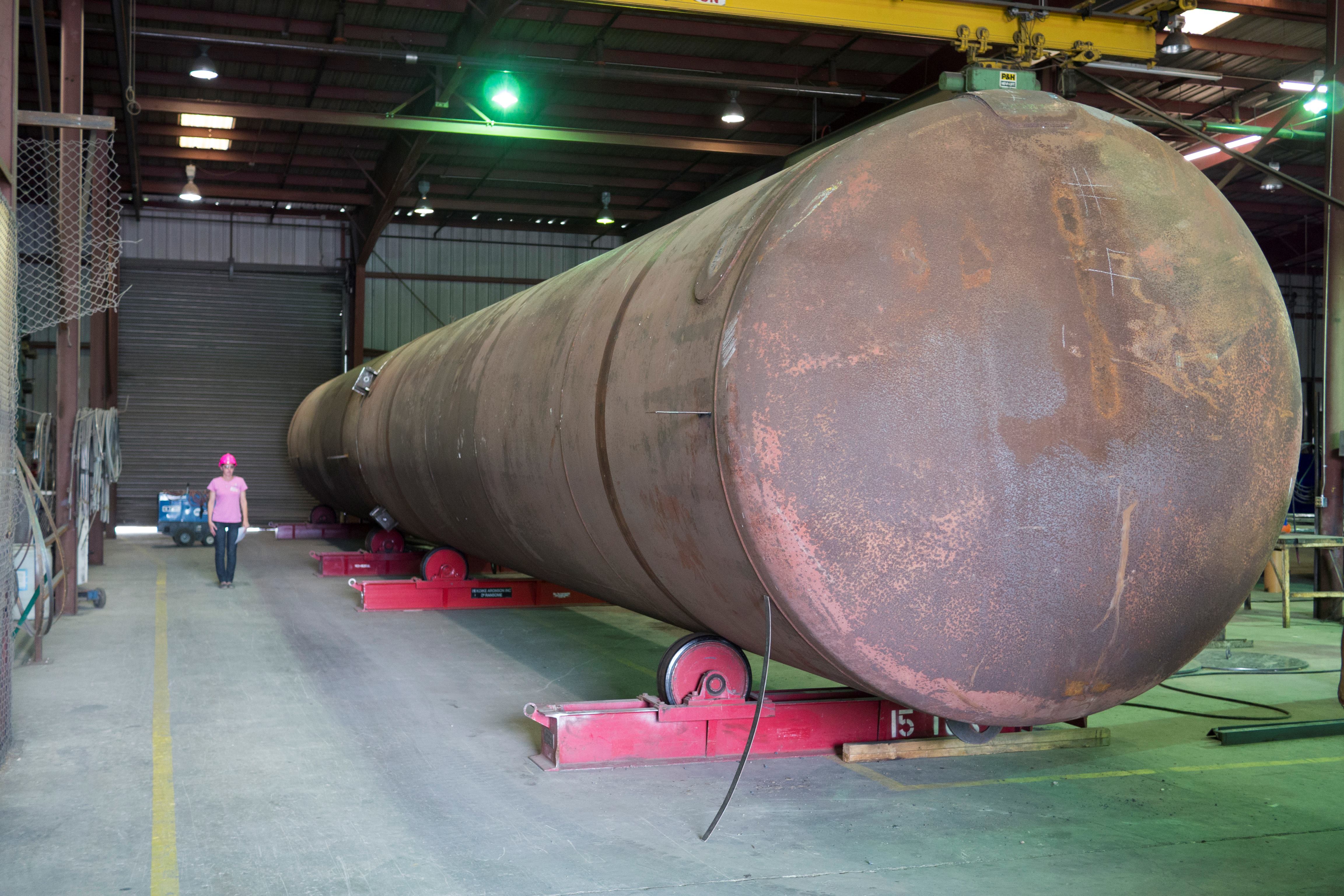 Steel columns made from former railroad tanks were cut and refitted to form the water slide's tower.