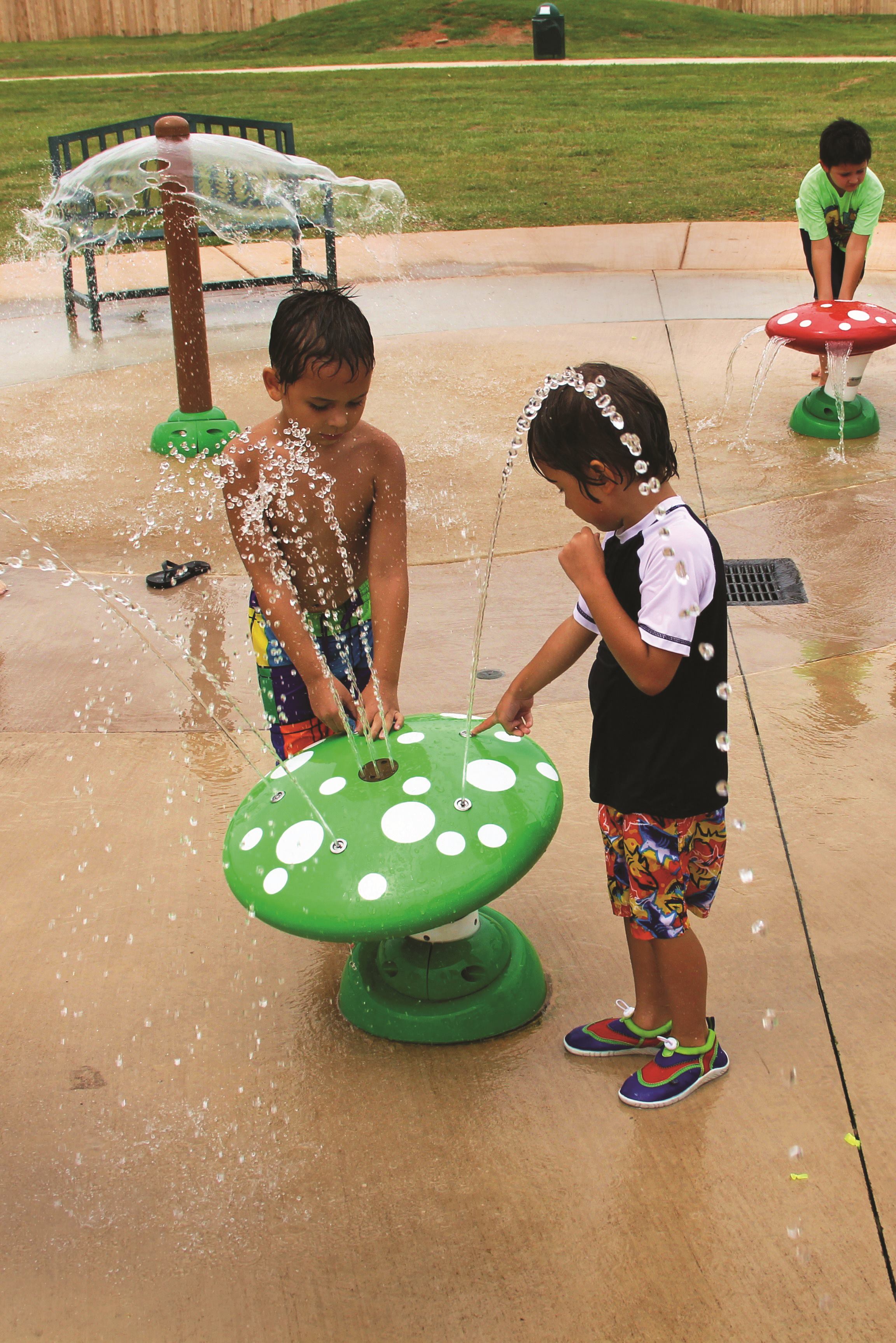 Custom mushrooms are set at a toddler-friendly height so little ones can support themselves while enjoying the various water streams.