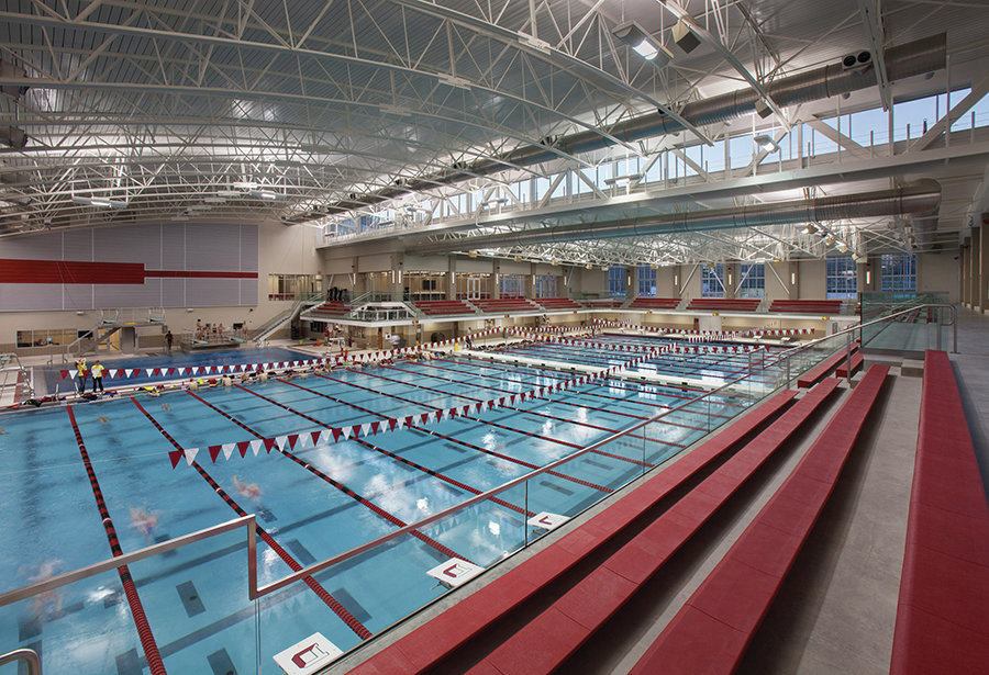 Theming for the facility revolves around Denison’s athletic mascot, Big Red, as well as the school colors of red and white. In addition, the design team sought to create high-volume, light-filled spaces that visitors and spectators will find welcoming. As an example, the second-floor main meeting room features floor-to-ceiling windows overlooking the entire aquatic area. The center was built to LEED specification, with efficient lighting, reduced water flow devices and HVAC systems designed to reduce energy consumption. The University intends to pursue Silver certification.