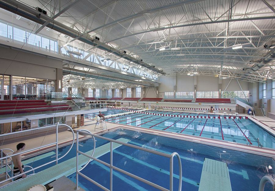 Say the designers: “Until the completion of the new Trumbull Aquatics Center, swimming and diving competitions were the only conference events Denison could not host on campus. The new Trumbull Aquatics Center provides the opportunity to host major meets, revamps the visitor experience, and provides a visible single point of entry that enhances security and oversight. It allows Denison to stand out among its North Coast Athletic Conference peers [and] gives Denison athletes a competitive training edge...”