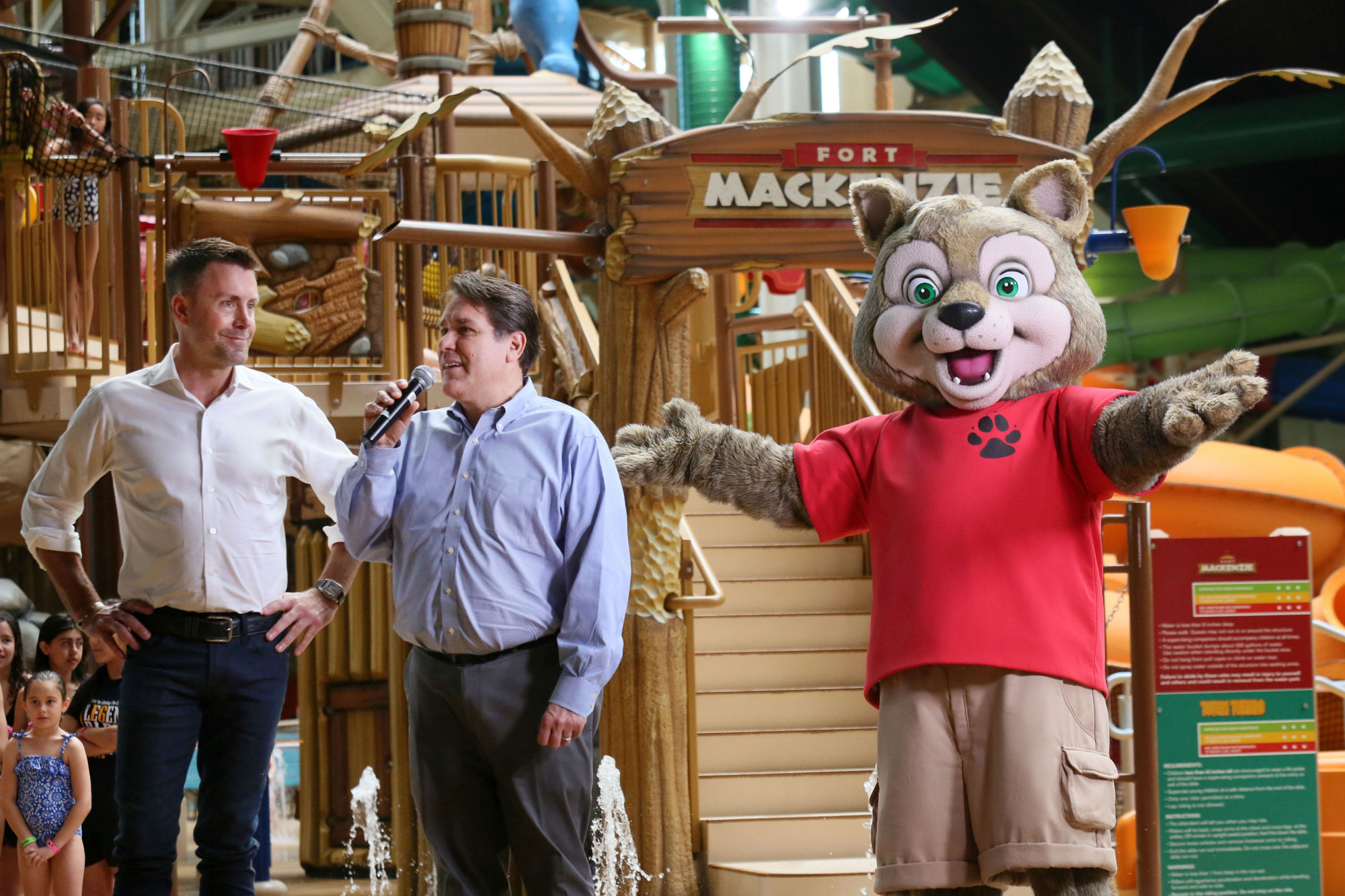 File photo: Great Wolf Resorts CEO Ruben Rodriguez and McWhinney CEO and founder Chad McWhinney along with Wiley the Wolf, welcome guests to the all-new Great Wolf Lodge Southern California resort during a grand opening ceremony in the property’s 105,000-square-foot indoor waterpark on March 4 in Garden Grove, Calif.