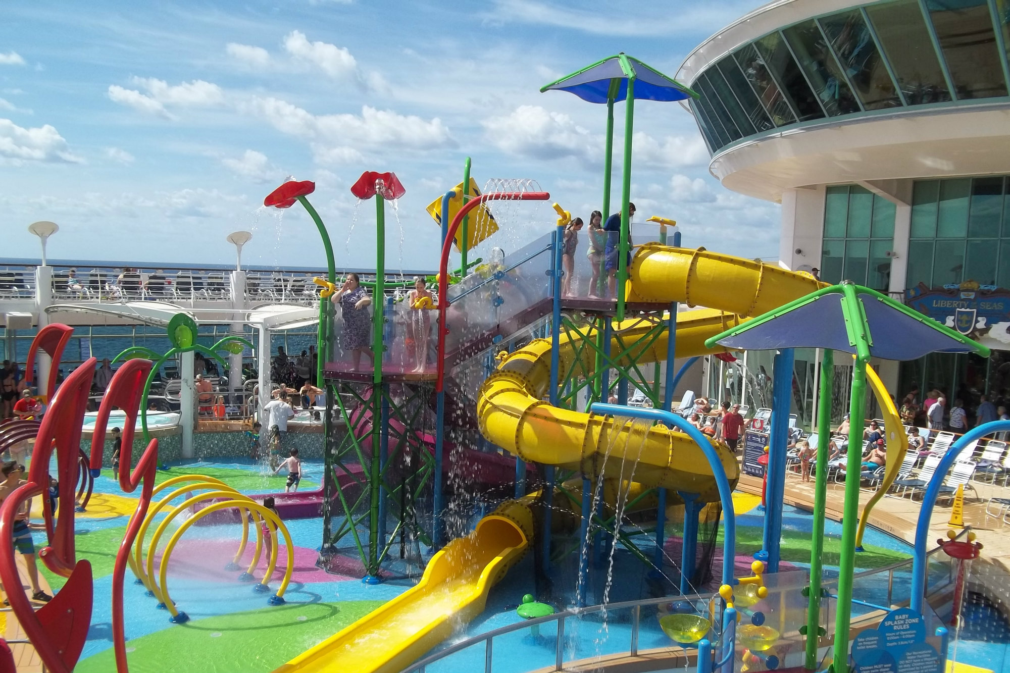 On the other structure, older kids can climb to the top and zoom down one of two curving, closed waterslides.