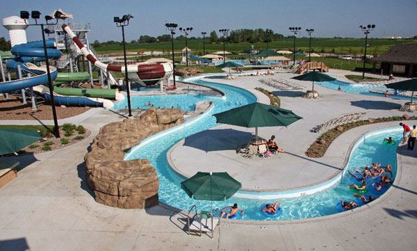 The completed facility has

21,880 square feet of water and has helped alleviate overcrowding

at other local pools. When planning, designers created a natural

look and included several features to improve operational

efficiency. One challenge was the fact that the facility is build

on the site of what was once a military munitions plant, with old

fuel tanks buried underground.