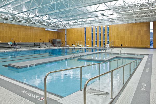 The Kodiak Island Borough Community Swimming Pool features a 6-lane-by-25-yard competition pool, a 1-meter diving board, a 24- to 42-inch-deep learn-to-swim training area, and a toddler wading area with bench seating. With an ADA accessible ramp and stair entry, high school students and

community patrons use the pool for a variety of lessons, fitness classes and special events. While swim team practice is in session,younger siblings and children can enjoy the adjacent shallow water.