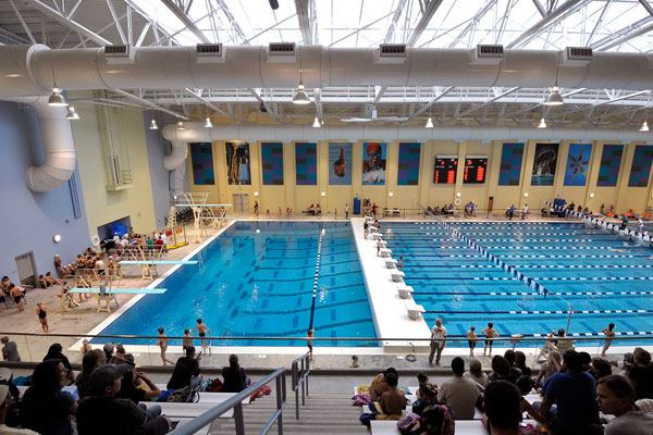 The 52,000-square-foot

center includes a competitive 50-meter pool with moveable bulkheads

and spectator seating for 800. The pool can be configured into 21,

25-meter practice lanes; 25-meter or 25-yard race lanes in the

center; or a diving and warm-down configuration. The versatility of

the bulkheads accommodates a variety of race formats and other

water sports such as water polo and underwater hockey. Before the

aquatic center was built, swim teams from across the district

practiced in the city’s only other indoor pool, which was

considerably smaller, and teams had to rotate their practices. Now,

several teams can hold practices

simultaneously.