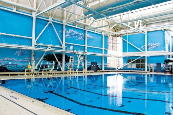 The aquatics area itself was built as part of a multi-phase renovation project. It was difficult to find contractors available to bid on the job was difficult because of the high volume of ongoing work nearby. To resolve this issue, designers opted for a pre-engineered modular

pool system, providing durability and high performance characteristics, while minimizing the need for additional trades people for construction and ceramic tiling. Designers also planned for longevity accounting for operational costs, maintenance and other factors. For example, features from the play structure were constructed from stainless steel to provide ultimate durability and low maintenance costs. Additional costs saving measures include VFD drives on pool circulation pumps and a slide layout that minimizes the need of additional staff members.