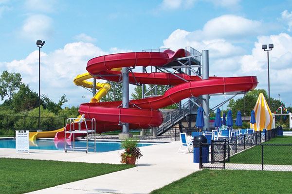 The aquatic center is the centerpiece of Hilliard Municipal Park. Among the amenities is a slide pool, featuring a 30-foot-high slide tower with a body slide and raft slide. Shade structures also are a key amenity.