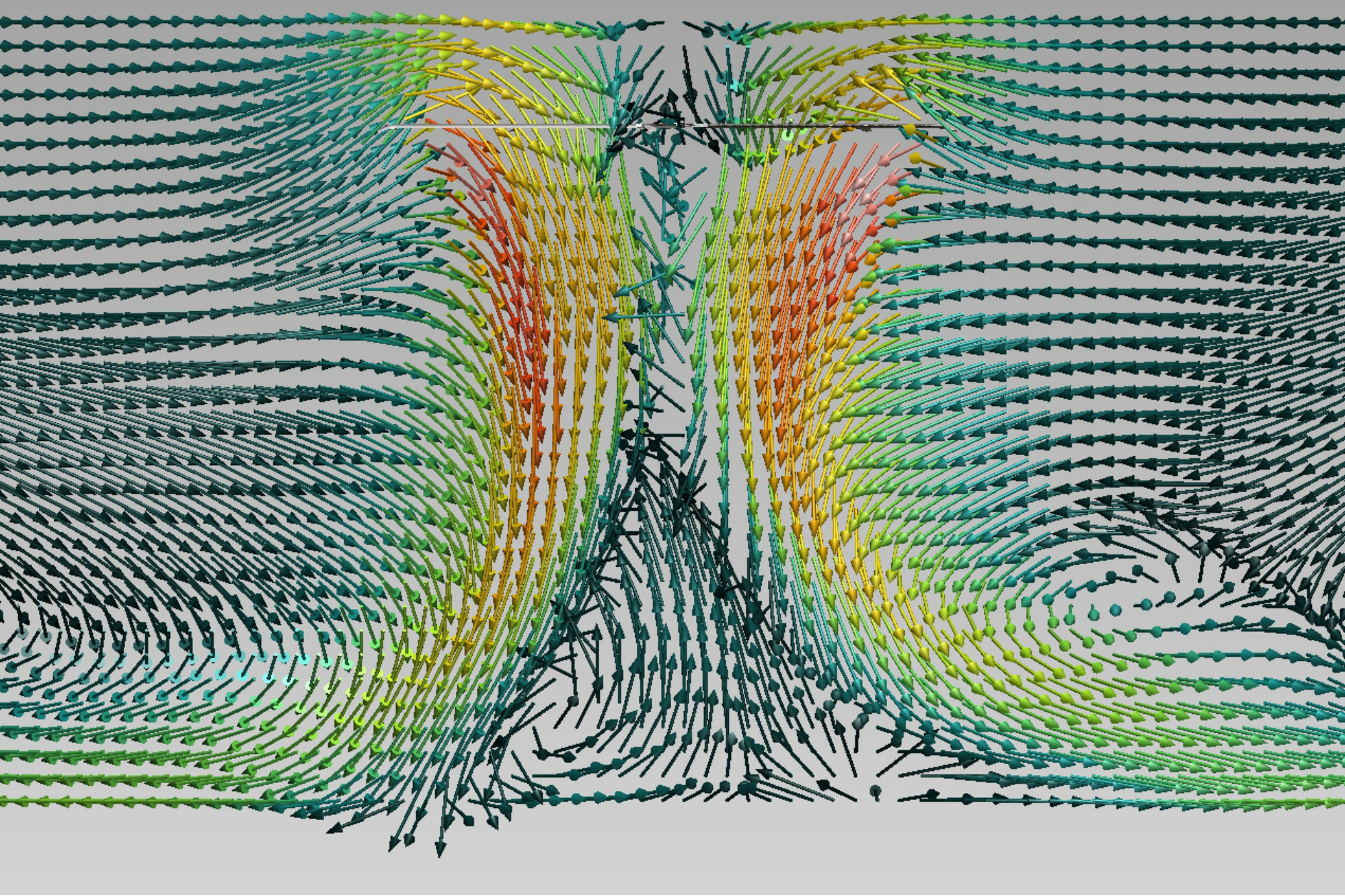 HIGH IMPACT The vectors in this wind velocity profile show airflow being drawn up from the pool surface, then forced downward and away from the fan center at a higher velocity (yellow and red vectors indicate the fastest speeds in miles per hour). Unhealthy chloramines in the air directly above the water surface then are displaced. Due to a constant downdraft, the HVLS fan produces a steady flow of fresh, healthy air toward the water surface.