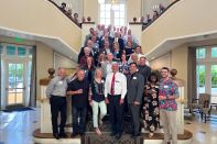 Charlie Luecker, front row center, at his retirement party